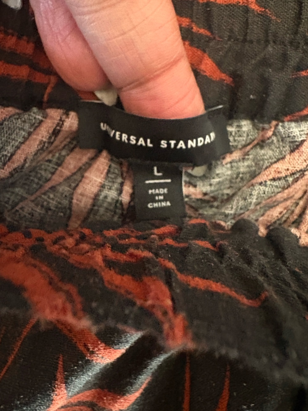 Universal Standard Black Chinos with Red Palm Print